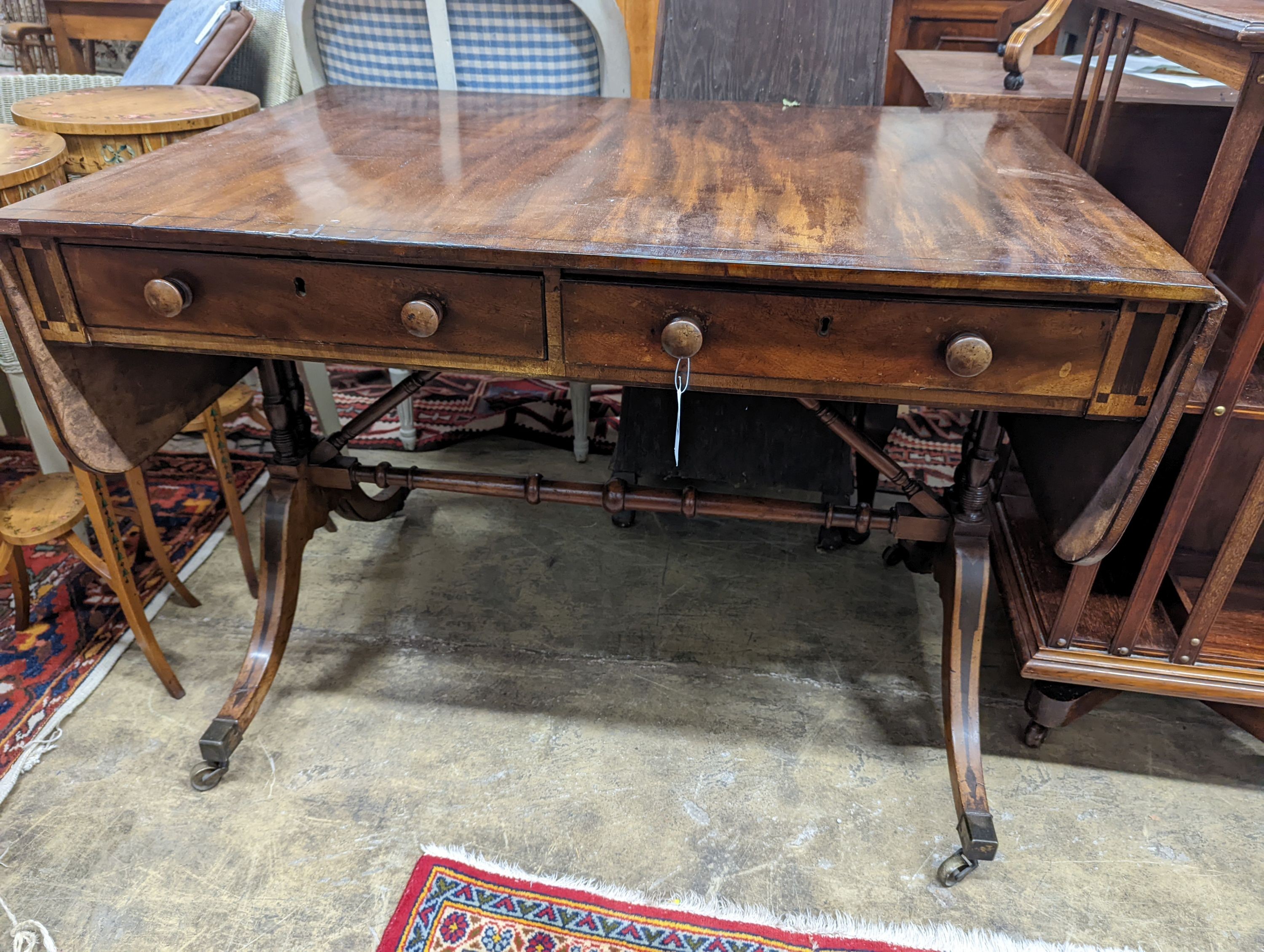 A Regency ebony inlaid mahogany sofa table, width 98cm, depth 69cm, height 72cm